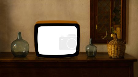 Photo for Footage of Dated TV Set with white Screen Mock Up Chroma Key Template Display, Nostalgic living room with furniture and old mirror, retro style Television, selective focus, vintage evening tv concept - Royalty Free Image