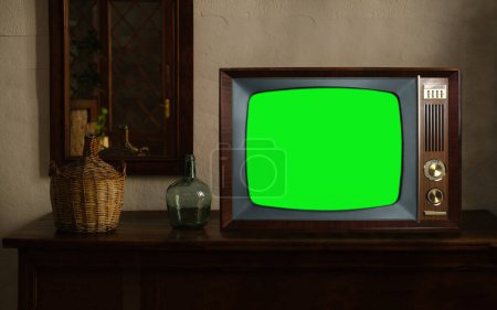 Photo for Footage of Dated TV Set with Green Screen Mock Up Chroma Key Template Display, Nostalgic living room with furniture and old mirror, Chroma Key, retro style Television, vintage evening tv concept - Royalty Free Image