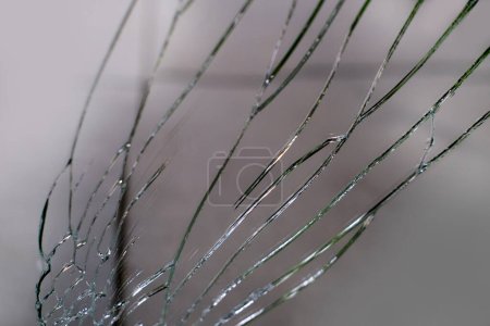 Photo for Large cracks on the texture of the broken mirror, glass, concept of stress, depression, destructive actions of vandalism, action insurance - Royalty Free Image