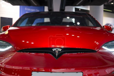 Photo for Ultra Red electric vehicle Tesla model X in Studio, SUV Powertrain in showroom, li-ion 4680 battery, alternative energy development concept, Elon Musk company, Frankfurt, Germany - September 26, 2023 - Royalty Free Image