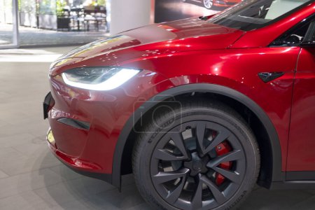 Photo for Ultra Red electric vehicle Tesla model X in Studio, SUV Powertrain in showroom, li-ion 4680 battery, alternative energy development concept, Elon Musk company, Frankfurt, Germany - September 26, 2023 - Royalty Free Image