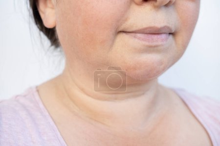 Photo for Happy 50-year-old woman with gentle smile on lips, maintaining psychological well-being in mature age concept, Maturity and Active Living, and joyful life - Royalty Free Image