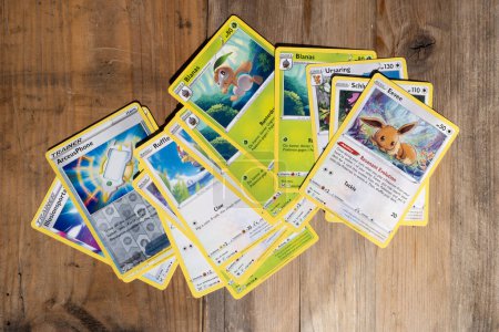 Photo for Collecting Pokemon Trading Card Game, collectible card game for children, Battle with friends, Educational Games, Pokemon Fan Culture, Frankfurt - October, 28, 2023 - Royalty Free Image