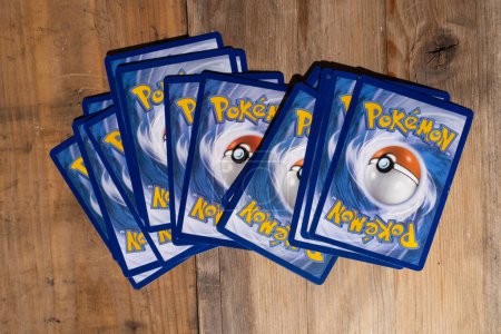 Photo for Collecting Pokemon Trading Card Game, collectible card game for children, Battle with friends, Educational Games, Pokemon Fan Culture, Frankfurt - October, 28, 2023 - Royalty Free Image