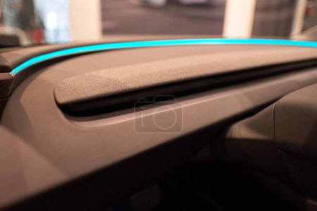Photo for Close-up Highland light strip Tesla electric car model 3 Interior, cockpit modern EV technologies car manufacturing, such autopilot, eco-friendly engines, Berlin, Germany - February 17, 2024 - Royalty Free Image