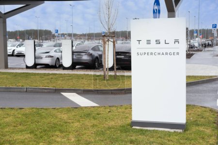 Photo for Logo Tesla supercharger v4 mit Lounge deutscher Fabrik Giga Berlin-Brandenburg Tesla location in Europe, sustainable and efficient facility yet in Berlin, Germany - February 19, 2024 - Royalty Free Image