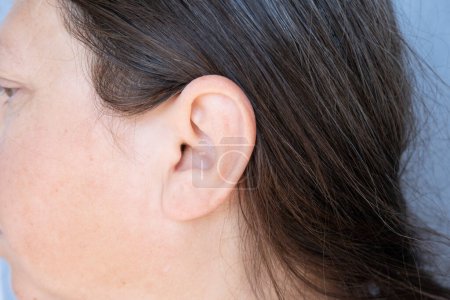 part face of female face, caucasian mature woman holding painful ear close up, Ear Discomfort, Hearing Test, Women's Health, Acute Otitis Media, Treatment and Care, Diagnosing and Treating
