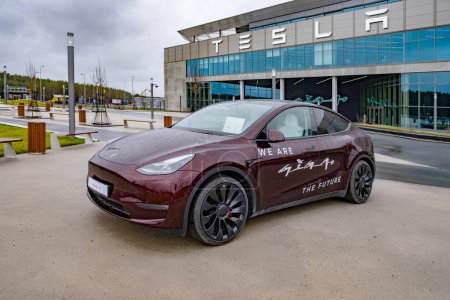 Photo for Tesla model y midnight cherry red, Gigafactory Berlin-Brandenburg Tesla manufacturing location in Europe, our most advanced, sustainable and efficient facility yet, Berlin, Germany - February 19, 2024 - Royalty Free Image