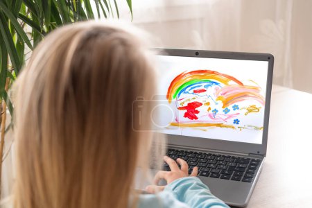 preschool girl 5 years old draws elements on laptop screen, technology drawing practice, Learning through play, Child's Hand in Learning Process, Digital literacy