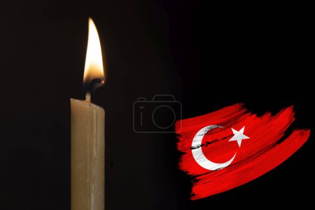 mourning candle burning front of flag Tunisia, memory of heroes served country, grief over loss, national unity in challenging times, state's history