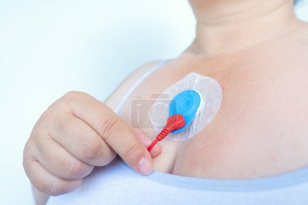 electronic sensor on chest for Holter monitoring, track pacemaker dysfunction, daily monitoring of electrocardiogram, blood pressure, cardiac examination, treatment of cardiac diseases