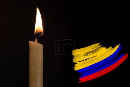 mourning candle burning front of flag Colombia, memory of heroes served country, grief over loss, national unity in challenging times, state's history