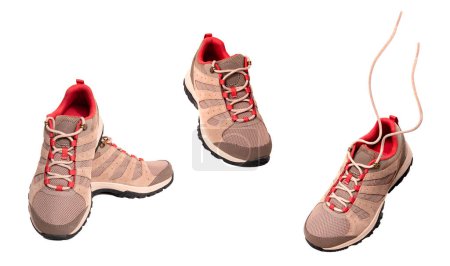 Conjunto de cómodas zapatillas de trekking marrones, botas de senderismo impermeables con cordones aislados sobre fondo blanco, calzado moderno, gamuza natural para senderismo al aire libre, camping