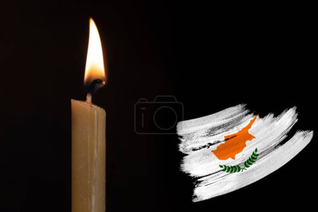 mourning candle burning front of flag Cyprus, memory of heroes served country, grief over loss, national unity in challenging times, state's history