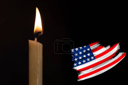 mourning candle burning front of flag USA, memory of heroes served country, grief over loss, national unity in challenging times, state's history