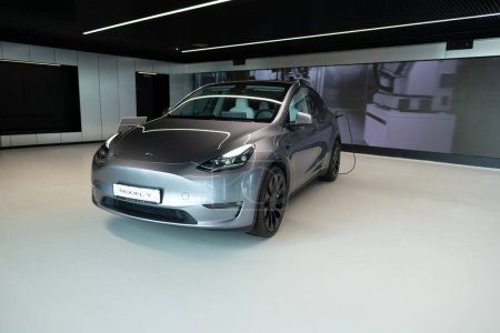 Photo for Quicksilver electric TESLA Model Y car performance in Gigafactory Berlin-Brandenburg manufacturing, SUV by Tesla, EV in Europe, Environmental sustainability, Berlin, Germany - April 26, 2024 - Royalty Free Image