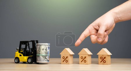 Photo for Choosing the best mortgage loan terms for real estate purchase. Financial goals and aspirations of becoming a homeowner. Navigating mortgage market. Exploring different options, comparing rates offers - Royalty Free Image