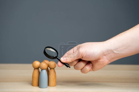 Photo for Businessman examines a team member. The concept of finding people and workers on the job. Management of team, the appointment of a leader. Hiring. Human resources - Royalty Free Image