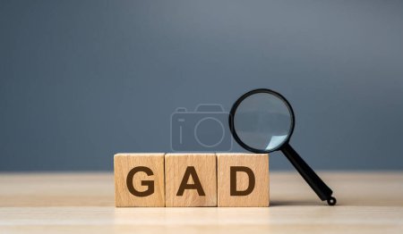 Photo for Wooden blocks GAD - Generalized Anxiety Disorder. Mental and behavioral and anxiety disorder characterized by excessive, uncontrollable and often irrational worry about events or activities - Royalty Free Image