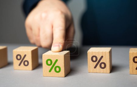 Photo for Pick a percentage. Choose the right loan plan. Determine the amount that can be afforded to borrow and repay. Money lenders can offer varying interest rates, fees, and terms. Boost your credit score - Royalty Free Image