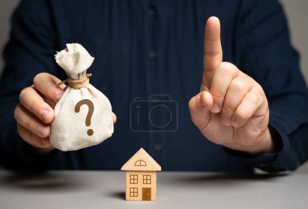 Photo for Home appraisal. Unknown problems and legal implications. Dubious deal. Uncertainty about the value of real estate. Repair and maintenance costs. - Royalty Free Image