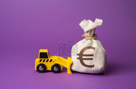Photo for A bulldozer pushes a euro money bag. Ineffective use of funds. Money down the drain. Wasted resources. Financing of dismantling works. Demolition services, land leveling. Industry machinery for rent - Royalty Free Image