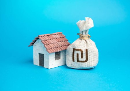 Photo for House and israeli shekel money bag. Real estate investment. Property value appraisal. Make a deal. Property Insurance. Taxes. Buy a house. - Royalty Free Image