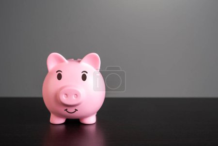 Photo for Smiling pig piggy bank with savings. Wealth and prosperity. Savings and deposit banking. Healthy economy. Successful investments and deposits. - Royalty Free Image