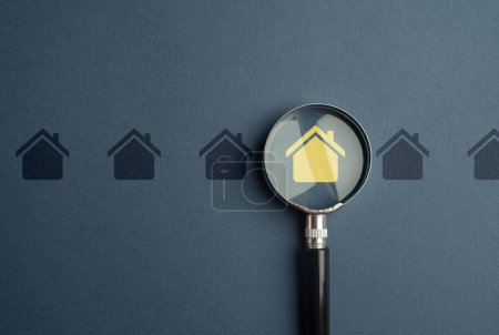 Photo for Find a suitable home. House and magnifying glass. Take a mortgage. Investments in immovable assets. Property Inspection before purchase to uncover any issues. Searching for real estate to buy. - Royalty Free Image