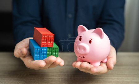 Shipping containers and piggy bank in hands. Potential for financial savings in trade. Logistics prowess in optimizing financial expenditures. Economizing, accumulating savings. Save money on shipment