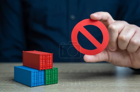 Photo for Shipping containers and prohibition symbol NO. Ban on import of goods. Sanctions and embargoes. Trade wars. Container shortage crisis. Blocking of cargo and blockade of trade routes. - Royalty Free Image