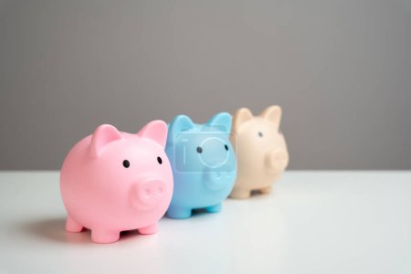 Photo for Three piggy banks. Savings and deposit banking. Healthy economy. Diversification of investments and savings. Banking. Good conditions from the bank. Increase capital. - Royalty Free Image