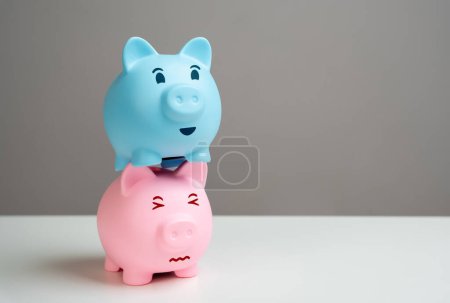 Das blaue Sparschwein nutzt das rosa finanziell aus. Das Konzept einer ungesunden Beziehung zwischen einem Paar, wenn der Partner arbeitslos ist oder die Rechte des Partners verletzt.