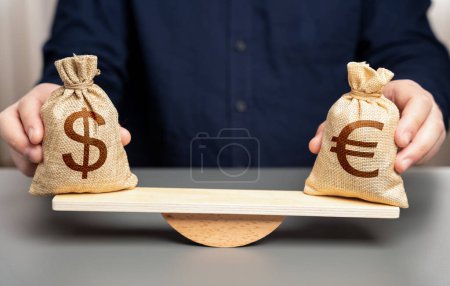 Wechselkurs zwischen Dollar und Euro. Vergleich zweier Volkswirtschaften. Zinssätze, Inflation. BIP Gesamtwirtschaftsleistung.