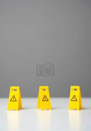 Photo for Perimeter warning signs. Be careful. No no zone. Overcome obstacles and forge ahead towards goals. Avoid trouble. Adaptability. Find a way through dangers and risks. Find a safe path. - Royalty Free Image