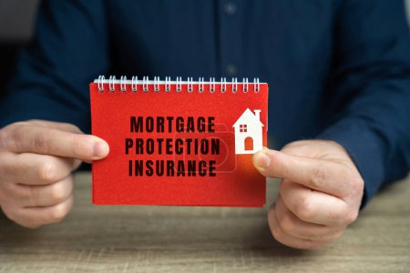 Mortgage protection insurance concept. Type of insurance policy that helps family make your monthly mortgage payments. Business and finance. Notebook and businessman