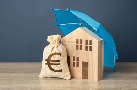 House with euro money bag and blue umbrella. Property insurance. Financial security. Protect investment and be prepared for unforeseen events. Repairs or rebuilding in the event of a covered loss.