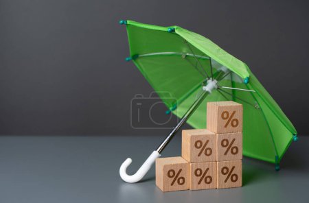 Seguro de depósito. Interés bajo un paraguas verde. Proteger los ahorros en caso de que un banco falle. Minimizar el riesgo de pérdida para los depositantes.