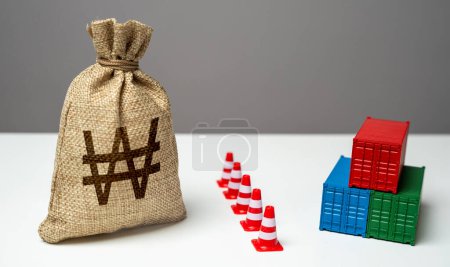 Photo for Shipping containers with goods and south korean won money bag are separated by a barrier. Logistics difficulties. Economic sanctions. Break a trade deal. Naval blockade. - Royalty Free Image