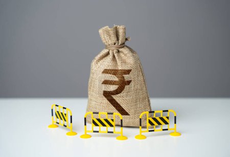 Sac roupie indienne est clôturé avec des barrières. Restrictions de capital. Empêcher les fluctuations rapides des taux de change. Limiter les possibilités d'investissement. Limiter la quantité d'argent entrant ou sortant.