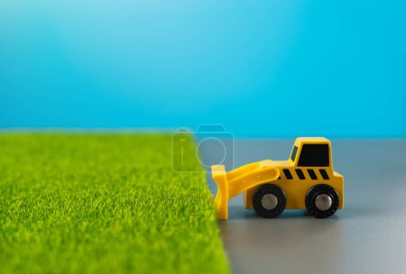 Bulldozer clears fertile land for construction. Preservation of natural resources and agricultural potential of the land. Conversion from agricultural to industrial or residential use.