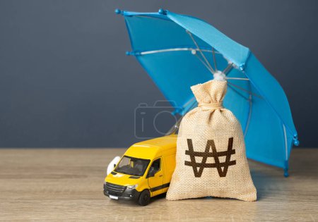 Yellow delivery van and south korean won money bag under an blue umbrella. Logistics security. Cargo and parcel insurance. Warranty obligations. Protection in conditions of military aggression