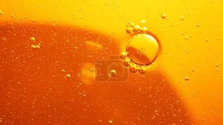 Yellow bubbles background, cooking oil emulsion, frying.