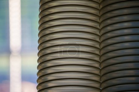 Photo for Flexible PUR antistatic suction hose for air conditioning, background flexi hose, industrial ventilation. - Royalty Free Image