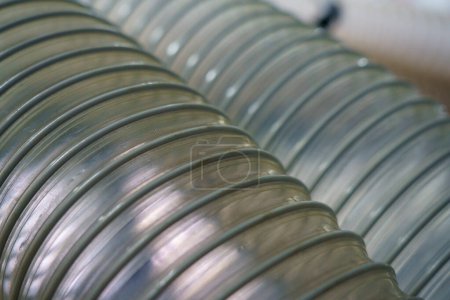 Photo for Flexible PUR antistatic suction hose for air conditioning, background flexi hose, industrial ventilation. - Royalty Free Image