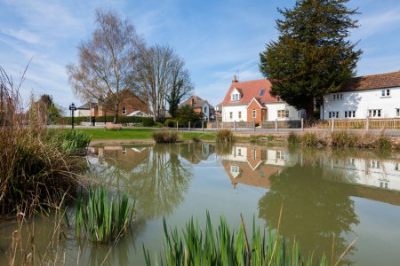 Ashley village green and pond in the sunshine, suffolk england