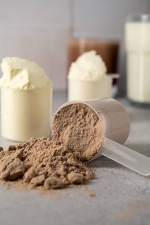 Protein powder and protein drinks, with scoops. Food supplement, bodybuilding, fitness and sport.