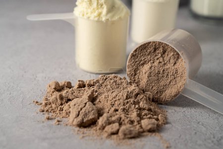 Protein powder and protein drinks, with scoops. Food supplement, bodybuilding, fitness and sport.