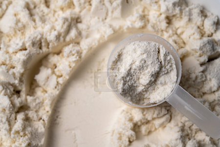 Protein whey powder with scoops. Food supplement, bodybuilding, fitness and gym lifestyle