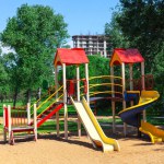 Playground in the public park . Colorful slides of playground for kids